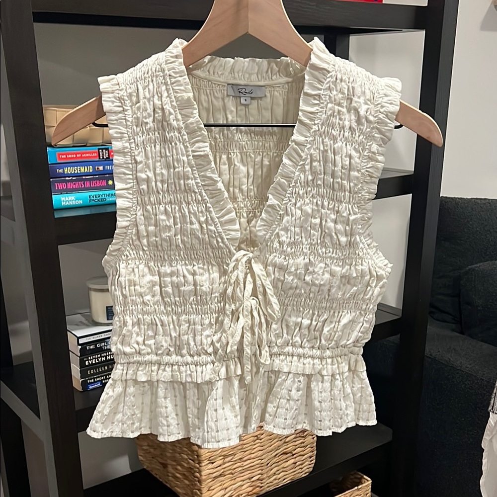 Cream Sleeveless Smocked Peplum Blouse